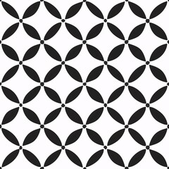 Fototapeta premium Monochrome Geometric Harmony: A seamless pattern of interlocking black circles and diamonds creates a bold, modern aesthetic.