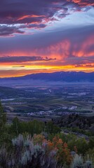 Fototapeta premium Vibrant Sunset Over Mountain Landscape.