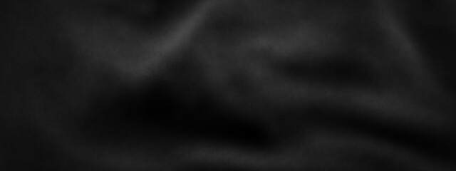 Abstract black leather background. Wavy leather.