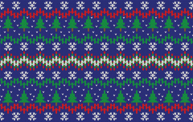 Knitted pattern seamless fabric Christmas on blue. traditional knitted pattern Christmas winter concept. Designed for Christmas ,background ,wallpaper ,knitted pattern ,fabric ,embroidery ,textile