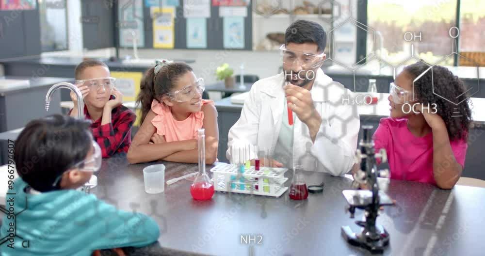 Poster chemistry formulas over teacher explaining experiment to students in science classroom
