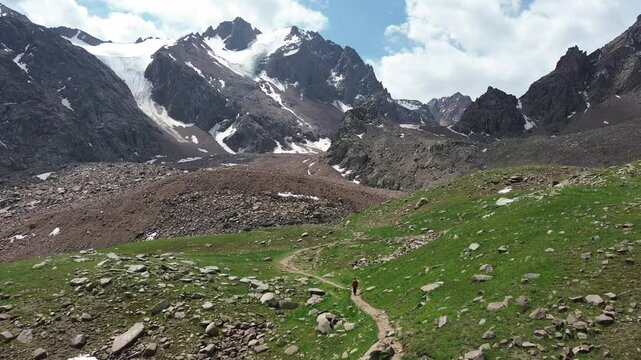 View of Kazakhstan glacier at Medeu Symbulak with snow and rocky peaks