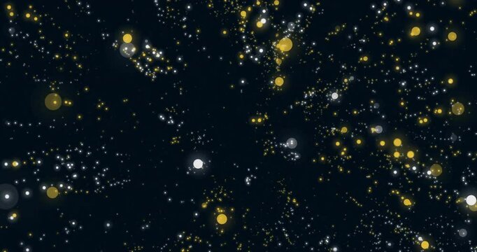 Glowing particles and light orbs animation over dark background