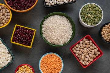 several pots with raw grains for preparing healthy food