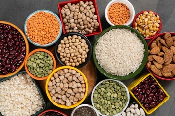 several pots with raw grains for preparing healthy food