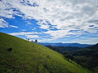 Fototapeta premium landscape with mountains and sky, Ta Nang Phan Dung forest, Vietnam