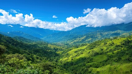 Naklejka premium Breathtaking greens of a mountainous landscape under a clear blue sky, ideal for nature and travel themes.