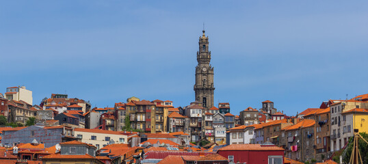 Obraz premium Panoramic view of UNESCO world heritage site Porto city in Portugal during sunny day with blue sky.