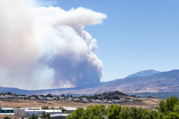 Massive plume of wildfire smoke seen over Reno Nevada from the North Valleys. Davis fire.