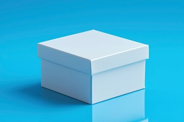Fototapeta premium White Cardboard Box on Blue Background