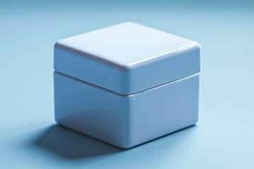 White Square Box with a Subtle Lid on a Light Blue Surface