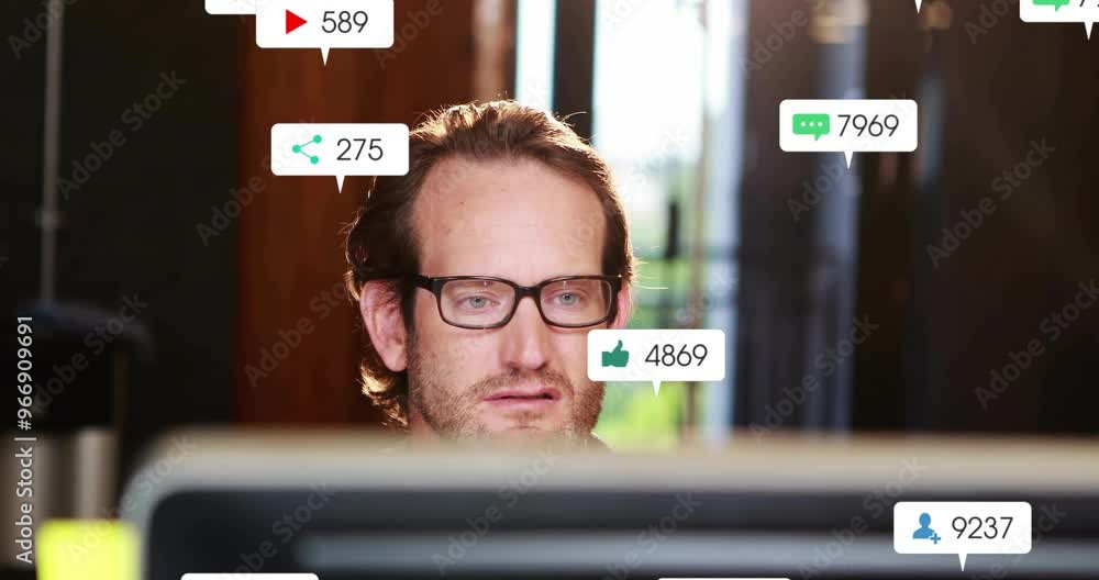 Poster animation of media icons over caucasian businessman using computer in office