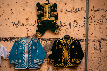 Obraz premium Boys' Clothing Hanging on Wall, Fes, Moroocc