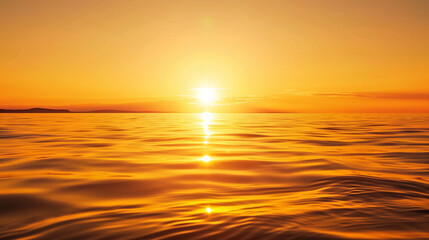 Obraz premium Golden sunset over calm ocean water