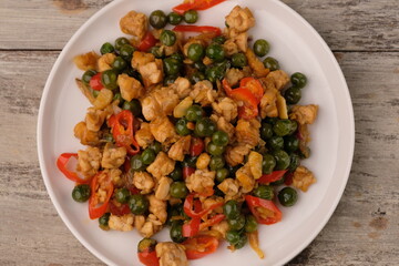 Saute tempeh and leunca. Tumis leunca tempe. Solanum nigrum, the European black nightshade or simply black nightshade or blackberry nightshade.