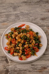 Saute tempeh and leunca. Tumis leunca tempe. Solanum nigrum, the European black nightshade or simply black nightshade or blackberry nightshade.