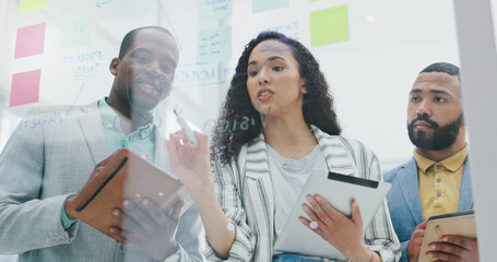 Tablet, glass and business people in office with notes, planning and brainstorming ideas for sales....