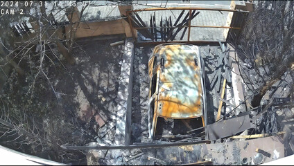 My own Dacia Duster WD 4x4, along with part of my garden and fence after a fire caused by a cigarette. This image serves as a powerful warning illustration of the dangers of fire, especially in extrem