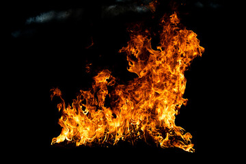 Flame fires. Burn lights on a black background. Fire flames on black background. Abstract fire...