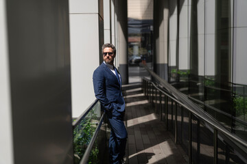 Successful business boss. Businessman in suit. Business man in modern glass office. Handsome man CEO. Successful future vision. New opportunities. Businessman in office building. Banner