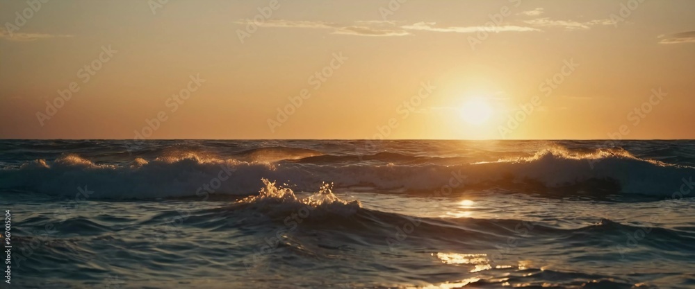 Poster the horizon glows with vivid oranges and reds as waves crash gently against the shore, reflecting th