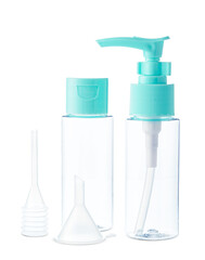 Clear plastic bottles with blue pumps and spray tops arranged on a white background