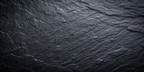 Tilted angle black stone textured background detailed dark pattern wallpaper