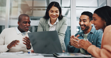 Happy, business people and applause with laptop for good news, teamwork or promotion together at...