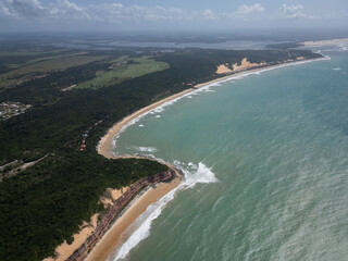 Obraz premium Beautiful aerial view to orange sandy cliffs and wild beaches