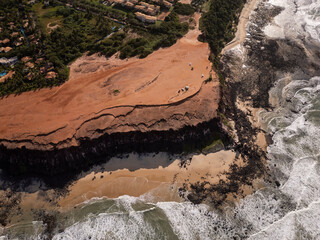 Beautiful aerial view to flat orange cliff top and wild beaches