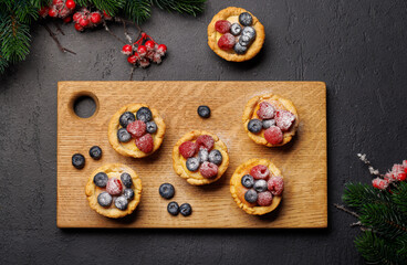 Festive delight: Christmas cupcakes adorned with berries