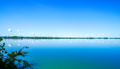 View of the Ismaning reservoir and the surrounding nature. Landscape at the reservoir in Bavaria, near Munich.