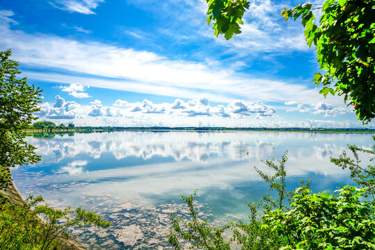 View of the Ismaning reservoir and the surrounding nature. Landscape at the reservoir in Bavaria, near Munich.