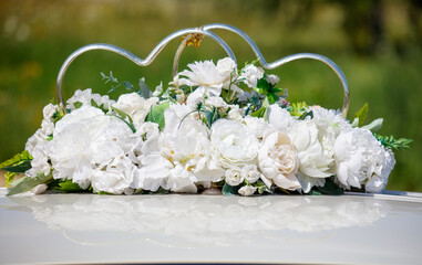 Wedding flowers on the car