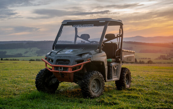 Quad Polaris Ranger off-road UTV in mountainous terrain