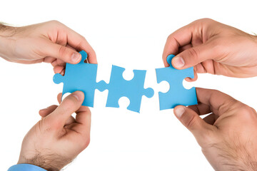 チームワークと協力を象徴するパズルピースの共同作業