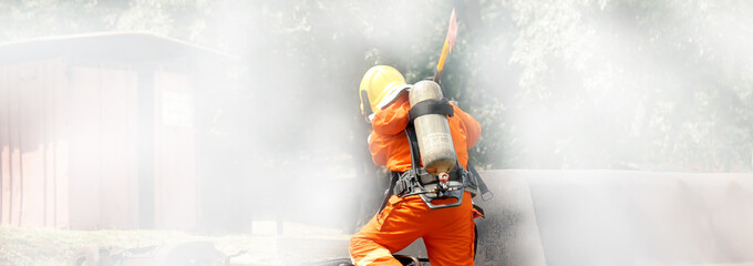 Banner Firefighter Rescue team training in fire fighting. Panorama Teamwork Firefighter fighting...