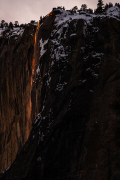 Yosemite's Firefall, glowing over El Capitan's snow-covered rock