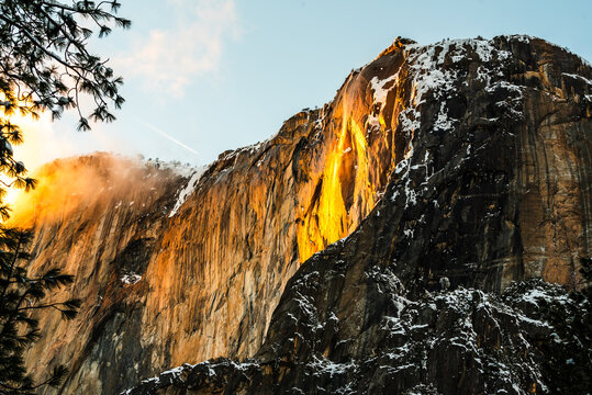 Horsetail fall illuminated by sunset, creating a firefall