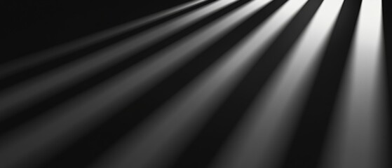 A black and white photo of a shadow with a light source behind it