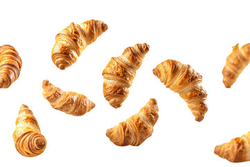 Croissants falling in the air isolated on white or transparent background