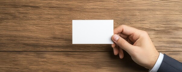 Obraz premium Entrepreneur designing a business card and other print marketing materials to promote their new venture, business card design for startup, branding and marketing
