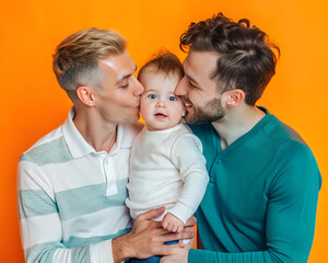 Gay family kissing their baby on bright background. Two fathers and their son