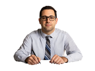a man sitting at a desk writing on papers