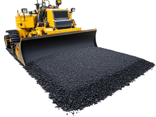 a yellow machine with a bucket of black gravel