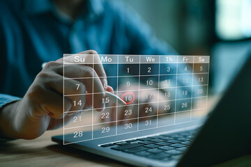 Calendar on the virtual screen interface, Businessman manages time for effective work, Highlight appointment reminders and meeting agenda on the calendar. Time management concept. Actions plans.