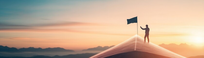 Naklejka premium Silhouette of a person standing on a hilltop with a flag, celebrating success at sunset.