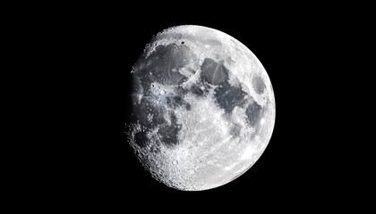 Obraz premium Closeup shot of the moon isolated on a black background