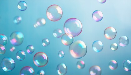 Obraz premium シャボン玉が飛ぶ 青色背景