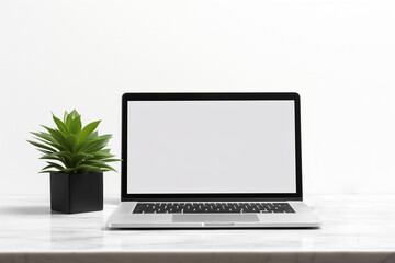 A modern office computer table featuring a blank laptop screen mockup, template for your text, perfect for design presentations.